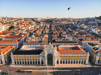High angle view of buildings in town against sky
