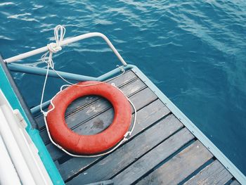 High angle view of life belt on boat in sea