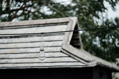 Low angle view of old roof and building