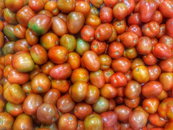 Full frame shot of oranges in market