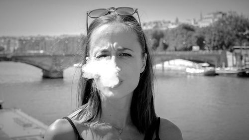 Portrait of young woman in water