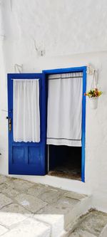 Blue door on white wall