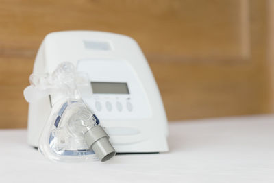 Close-up of medical equipment on table