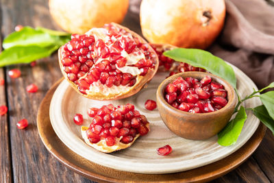 Close-up of fruits in plate on table