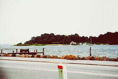 Scenic view of calm sea against clear sky