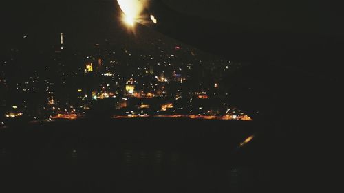 View of illuminated city at night