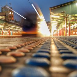 Blurred motion of train against sky in city