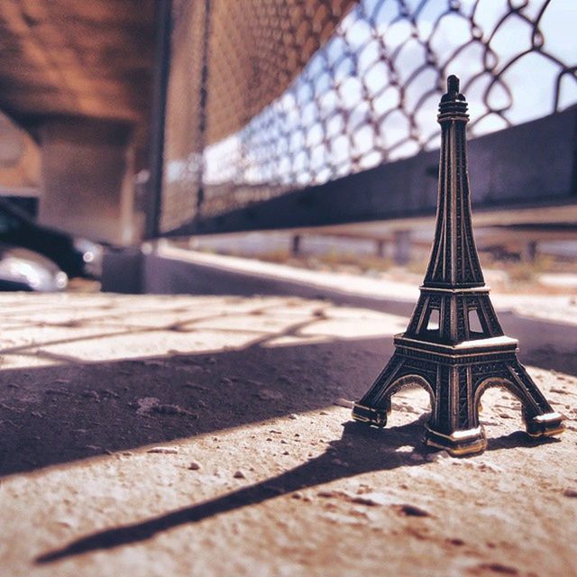 built structure, architecture, building exterior, focus on foreground, famous place, travel destinations, travel, metal, tourism, selective focus, sunlight, close-up, international landmark, capital cities, shadow, incidental people, city, day, religion, place of worship