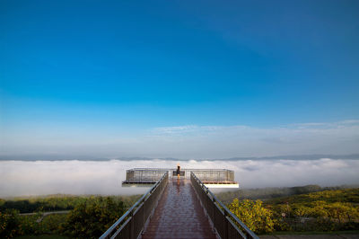 View of bridge against cloudy sky