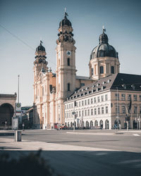 View of buildings in city against sky