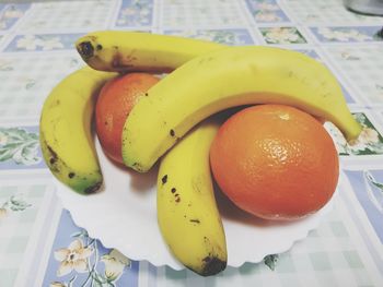 Close-up of fruits in plate on table