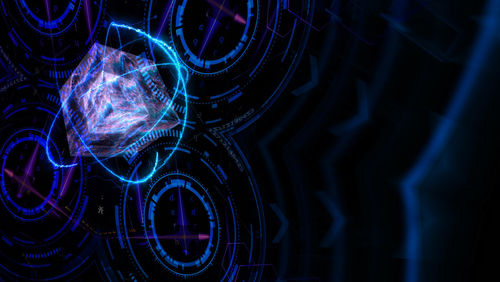 Close-up of light painting against black background