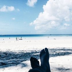 Scenic view of sea against cloudy sky