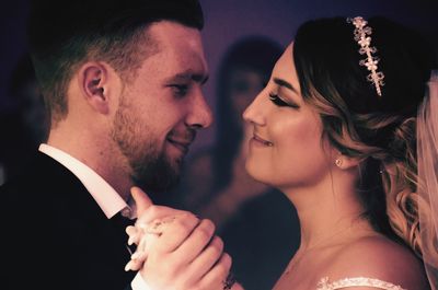 Portrait of couple with hands