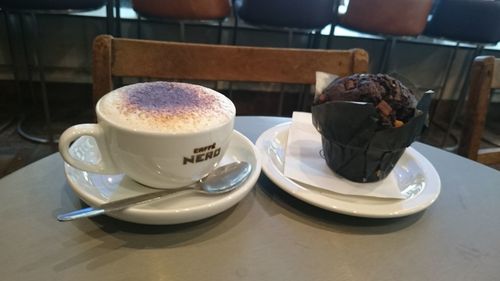 Close-up of coffee cup on table