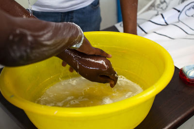 Close-up of person preparing food