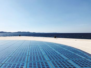 Scenic view of blue sea against sky of sun panel city sight in zadar croatia