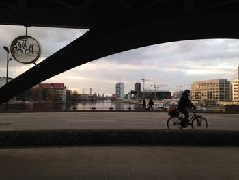 People walking on road in city