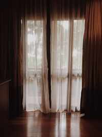 View of curtains on window at home