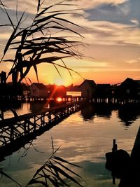 Scenic view of sunset at harbor