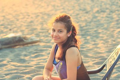 Portrait of a smiling young woman at beach