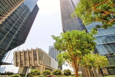 Low angle view of modern buildings against sky