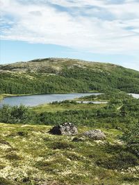 Scenic view of land against sky