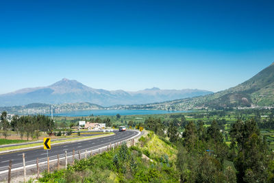 Scenic view of landscape against clear blue sky