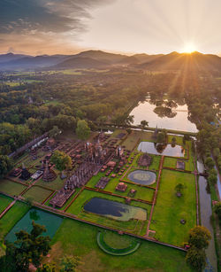 High angle view of buildings against sky during sunset