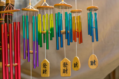 Close-up of wind chimes at market