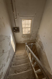 High angle view of staircase in abandoned building