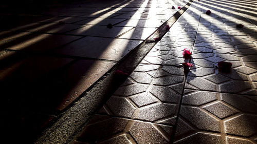High angle view of woman walking on street