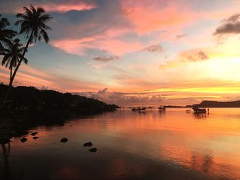 Scenic view of lake against sky during sunset