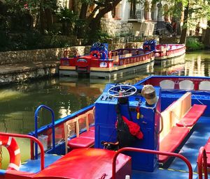 Boats moored at harbor