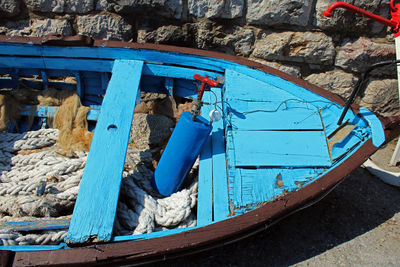 High angle view of fishing boat moored at beach