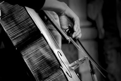 Cropped image of person playing violin