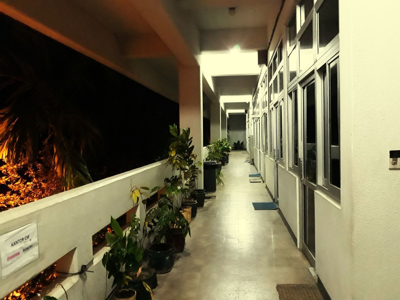 VIEW OF EMPTY CORRIDOR OF BUILDING