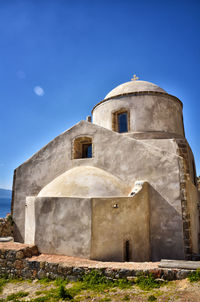 Old building against blue sky