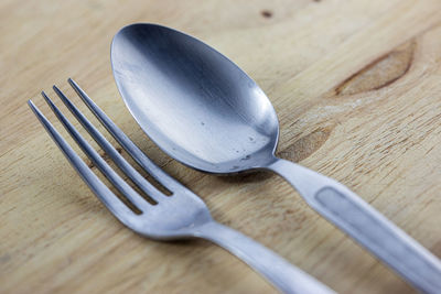 High angle view of fork on table