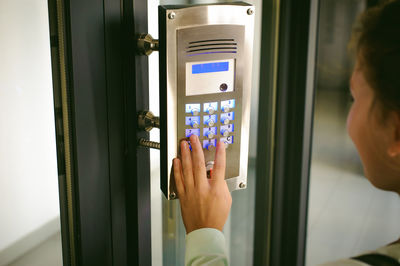 Close-up of woman hand in train