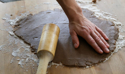 High angle view of person preparing food on table