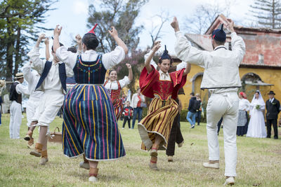 Group of people standing on field