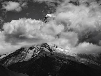 Scenic view of snowcapped mountain against sky