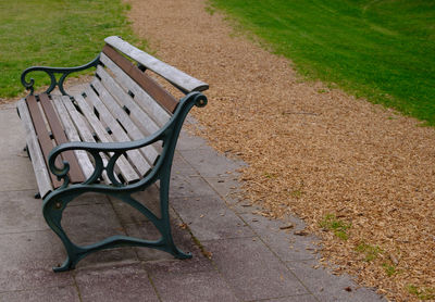 Empty bench in park