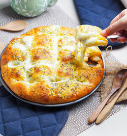 High angle view of mozarella bread on table