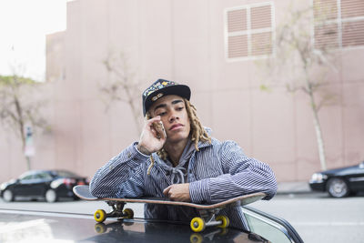 Young man and skateboard.