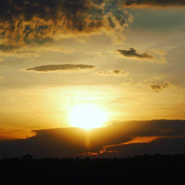 sunset, sun, scenics, silhouette, orange color, beauty in nature, tranquil scene, sky, tranquility, idyllic, cloud - sky, nature, sunlight, sunbeam, landscape, cloud, dramatic sky, majestic, outdoors, back lit