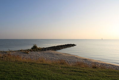 Scenic view of sea against clear sky