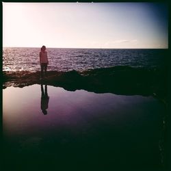 Scenic view of sea against clear sky