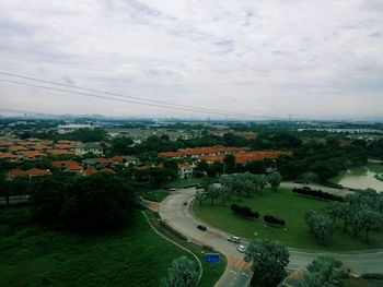 High angle view of buildings in city against sky